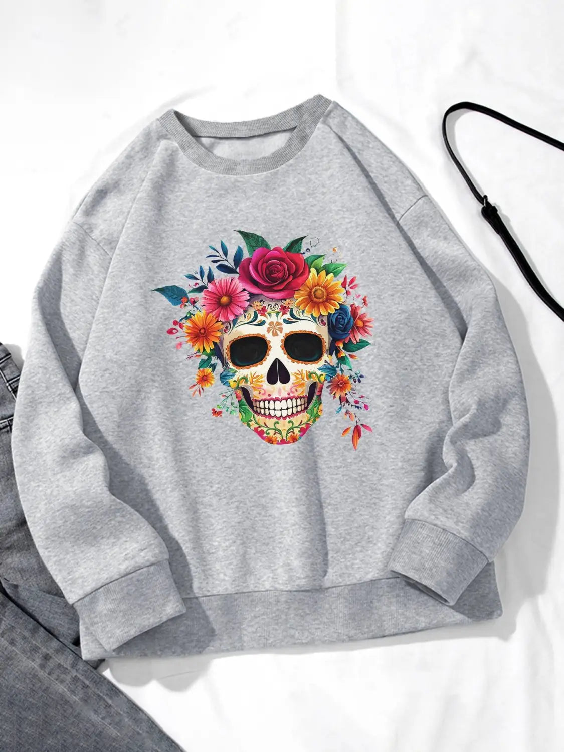 gray crew neck sweatshirt for daily wear featuring a vibrant colorful floral sugar skull design on the front with basic long sleeve style