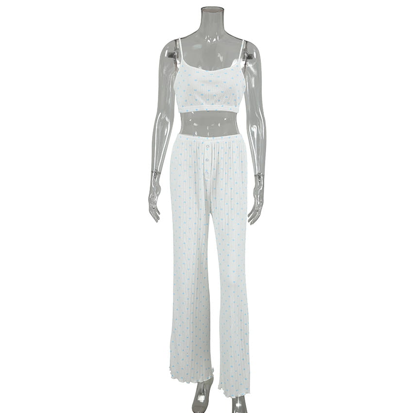 white crochet crop top and matching pleated pants set with subtle light blue polka dots featuring knitted heart printing for a heart printing comfortable loungewear set