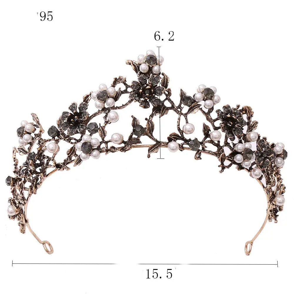 A floral black diamond pearl baroque bridal crown featuring an ornate silver-toned tiara adorned with intricate floral designs and alternating white pearls and dark gemstones.