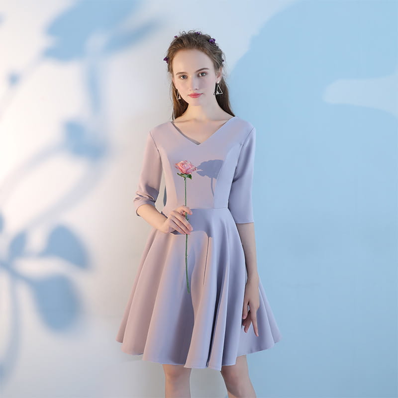 a pink short sisters soft lavender v-neck midi dress with three-quarter sleeves and flared skirt made from main fabric featuring an embroidered pink rose on the bodice