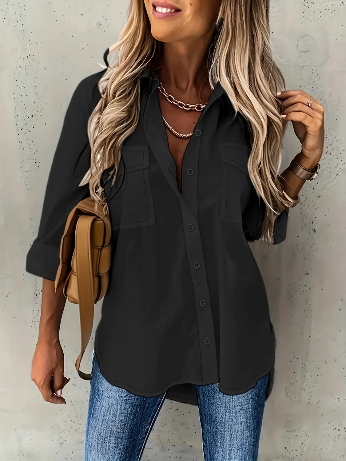 black button-up shirt with two chest pockets and rolled sleeves featuring a long sleeve lapel design suitable for loose long sleeve styling