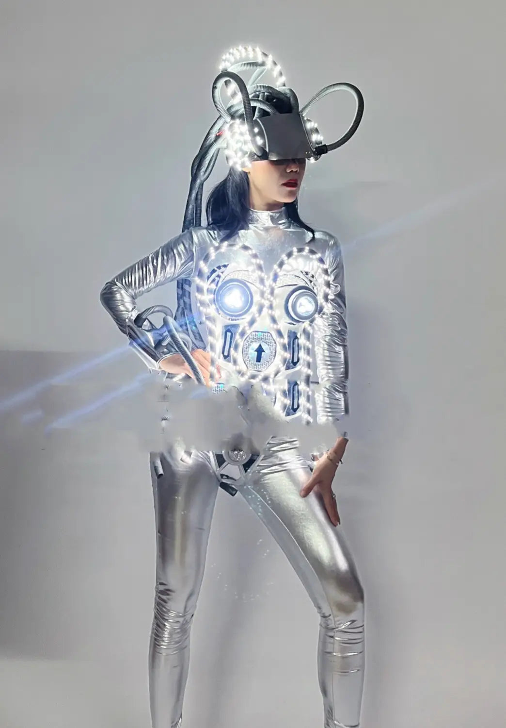 shiny silver metallic bodysuit featuring led luminous chest armor with glowing blue circular lights and intricate circuit-like patterns for a costume led luminous effect