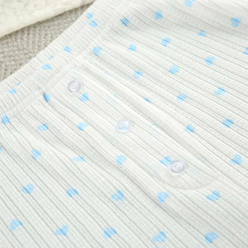 white knitted heart printing ribbed fabric with light blue heart patterns and clear buttons in a comfortable loungewear set