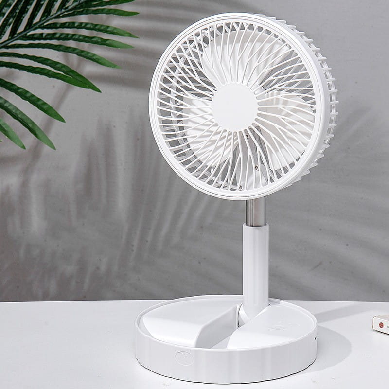 white portable desk fan with a sleek modern design and circular grille featured as a quiet portable telescopic folding fan