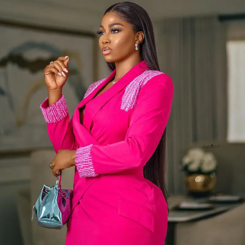Vibrant pink blazer featuring a rose red suit collar with sparkling lavender trim and textured cuffs in the rose red suit collar embellished wrap dress.