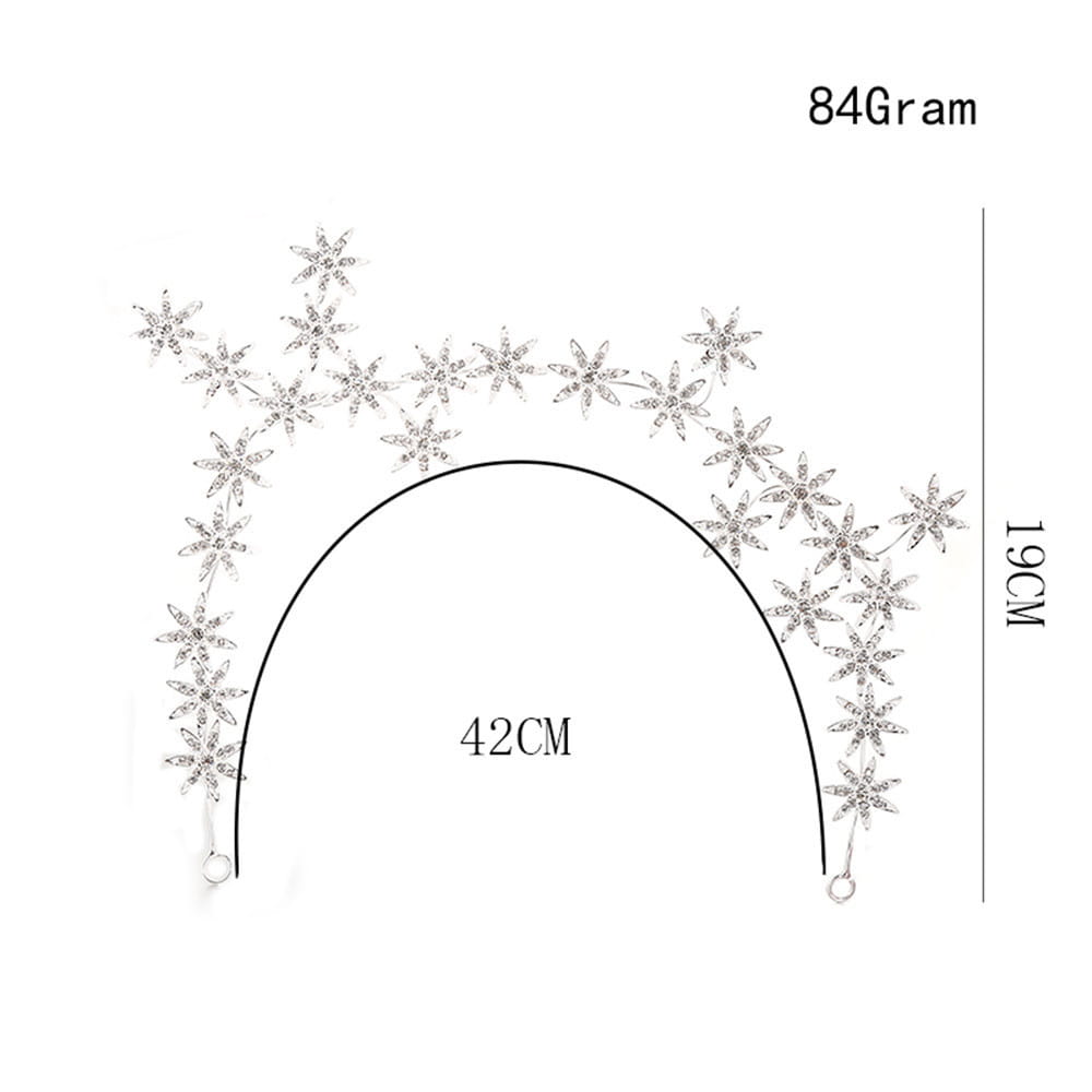 A delicate silver star-shaped rhinestone starry hair band designed as an elegant hair accessory starry arching across the hair.