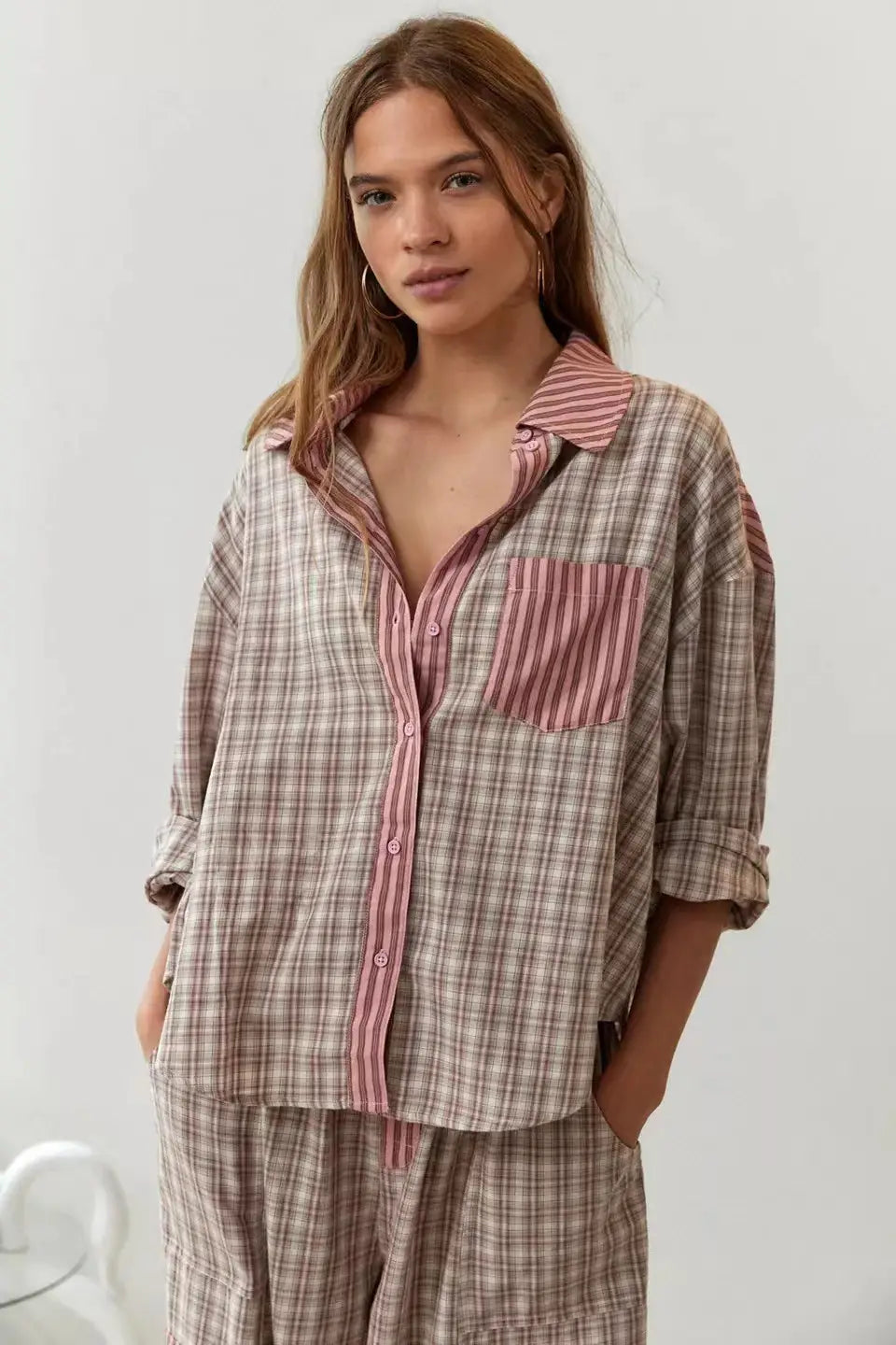 a soft oversized dressing gown plaid shirt in muted beige and brown with a contrasting pink and white striped collar and pocket trim for a relaxed plaid shirt outfit