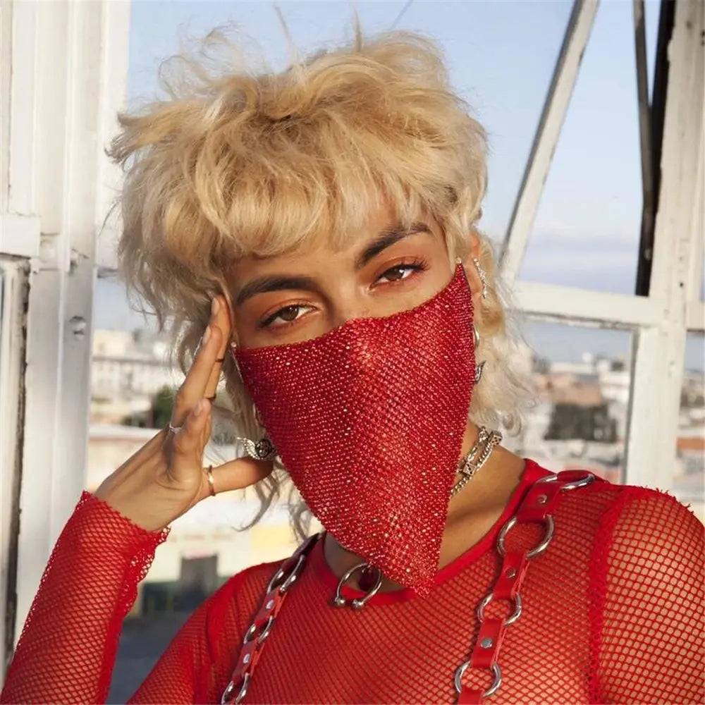 red sparkly face mask featuring rhinestone metal flash embellishments and a mesh-like texture for metal flash jewelry style protection and fashion.