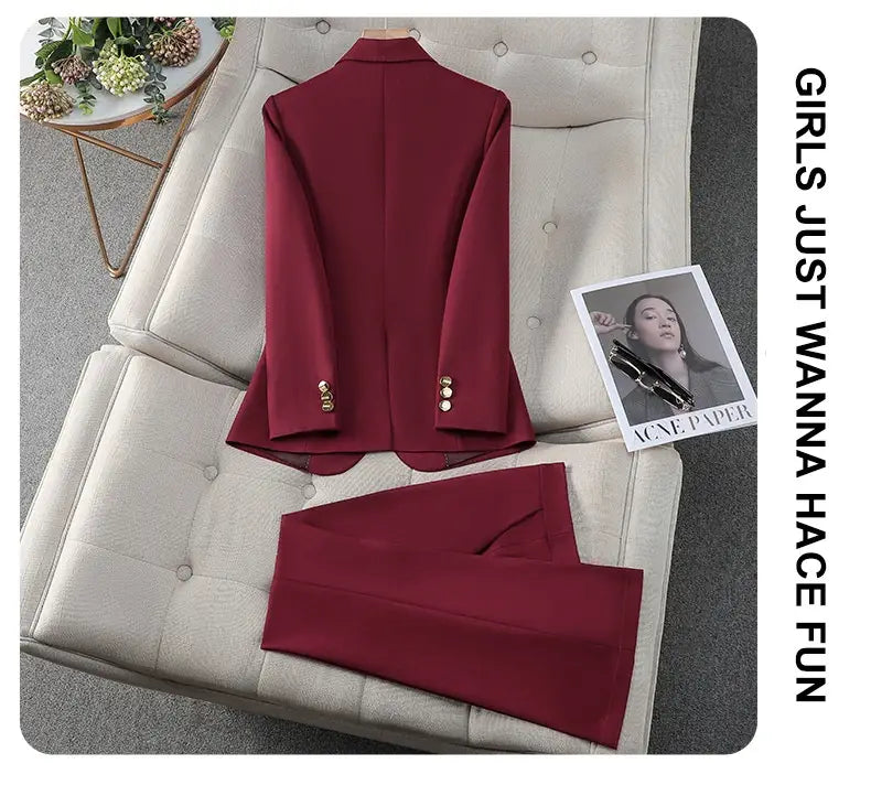 a sleek light blue tailored business suit featuring gold buttons paired with a wine red blazer in a wine red suit style with a tailored fit
