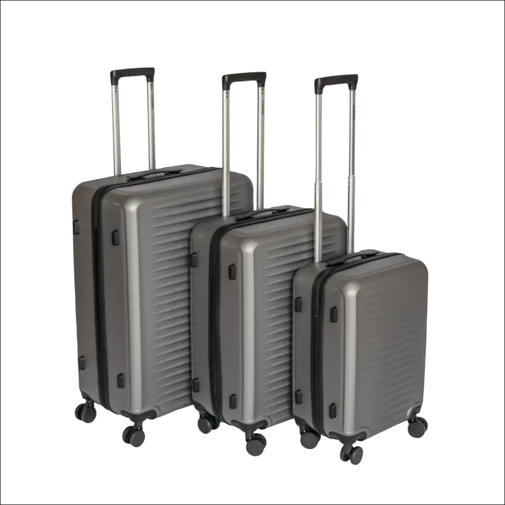 Set of three dark gray hard shell suitcases with black trim and silver telescoping handles for versatile travel use