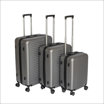 Set of three dark gray hard shell suitcases with black trim and silver telescoping handles for versatile travel use