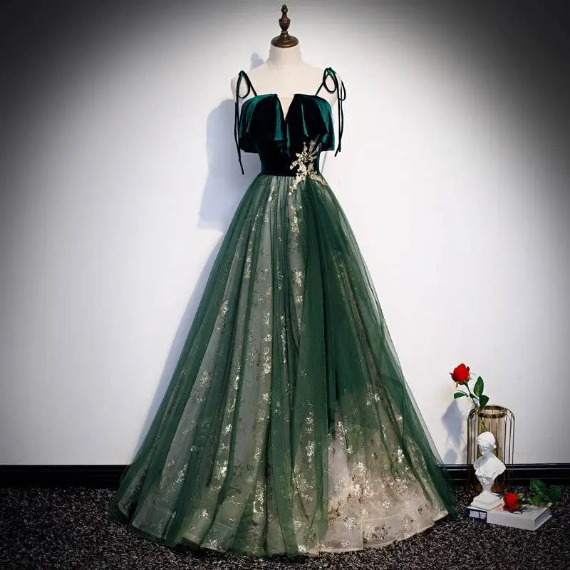 Emerald green velvet and tulle long banquet gown with gold floral embroidery featuring banquet sling temperament style