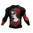 Black long-sleeved dark mystic rash guard compression shirt featuring a vibrant sugar skull woman with red roses design