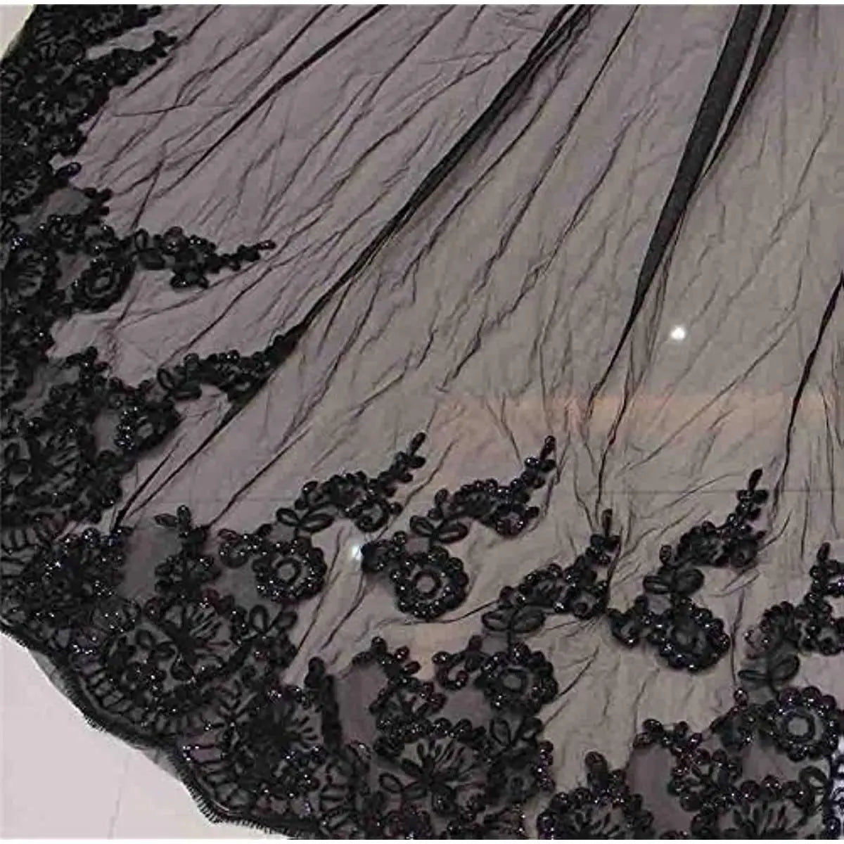 black lace wedding veil with delicate floral embroidery and beaded detailing on sheer translucent fabric designed as photography accessories halloween for traveling photo photography.