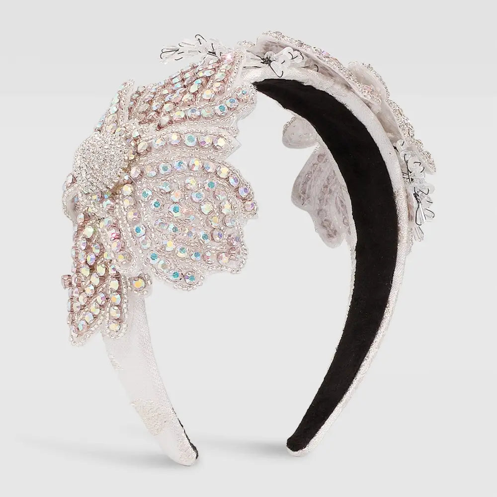 A sparkling silver vintage crystal floral temperament hair accessory featuring intricate beaded floral embellishments and delicate lace detailing.