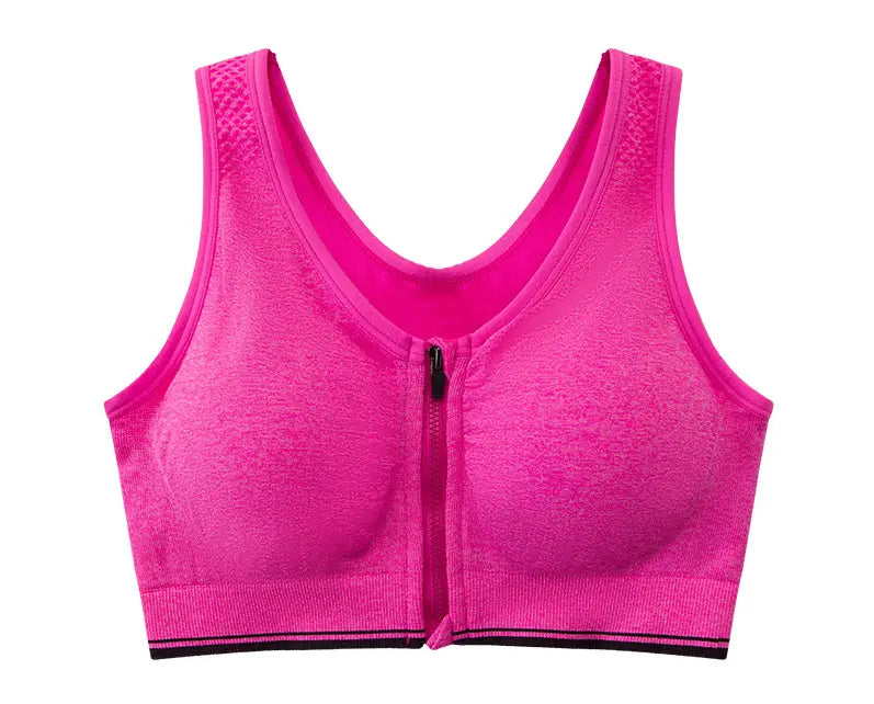Bright pink zipper sports bra with front zipper, mesh detailing on the shoulders, and black trim along the bottom edge.
