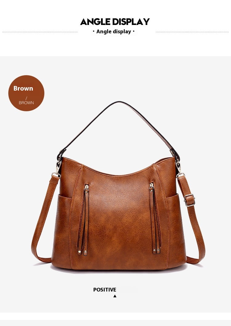 Brown leather luxury women leather hobo bag with large capacity featuring two front zippered pockets and a detachable strap.