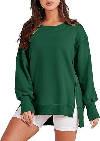 green solid oversized sweatshirt with side slits and ribbed cuffs featuring a crew neck design