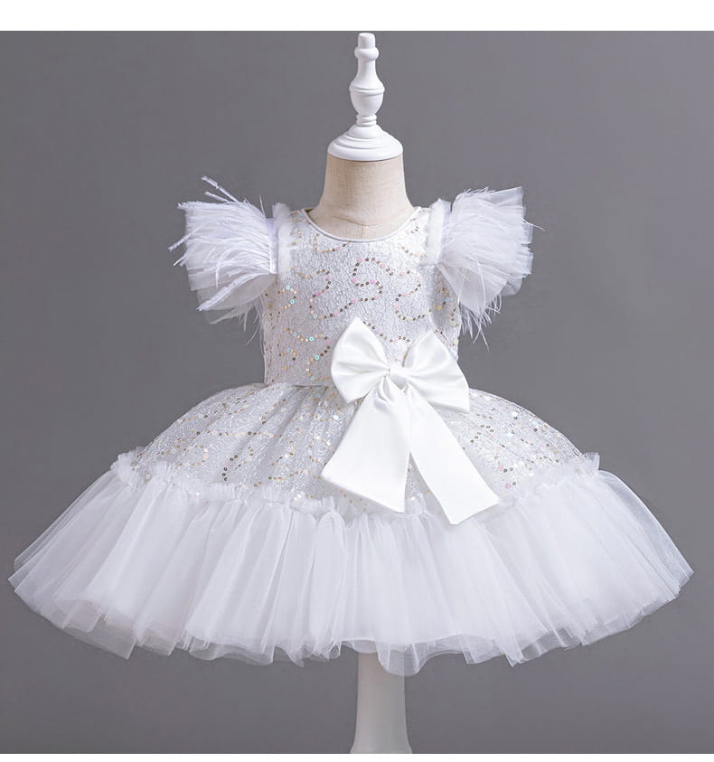White sequined wedding dress tulle featuring a dress tulle skirt with feathered puff sleeves and a large satin bow at the waist, ideal for tulle skirt summer occasions.