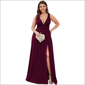 Deep v-neck sleeveless burgundy swing dress in flowing satin with a plunging neckline and high slit