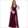 A deep v-neck sleeveless burgundy satin swing dress with a plunging neckline and high slit evening gown