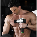 Silver and black epson deep vibration shock massage gun with multi-block adjustment and interchangeable massage heads