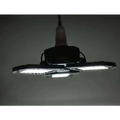 Black foldable deformable lamp garage light with three illuminated adjustable panels and a power cord hanging from the top