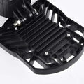 Black plastic motorcycle footpeg with ribbed texture and metallic screws compatible with deformable lamp garage light adjustable panels