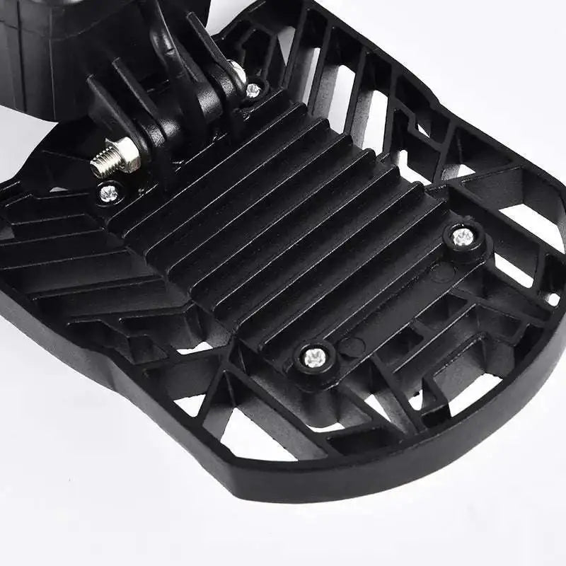 Black plastic motorcycle footpeg with ribbed texture and metallic screws compatible with deformable lamp garage light adjustable panels