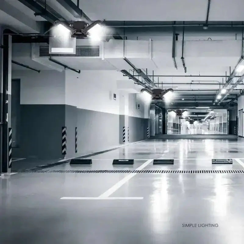Industrial-style deformable lamp garage light with adjustable panels featuring a sleek modern ceiling-mounted design