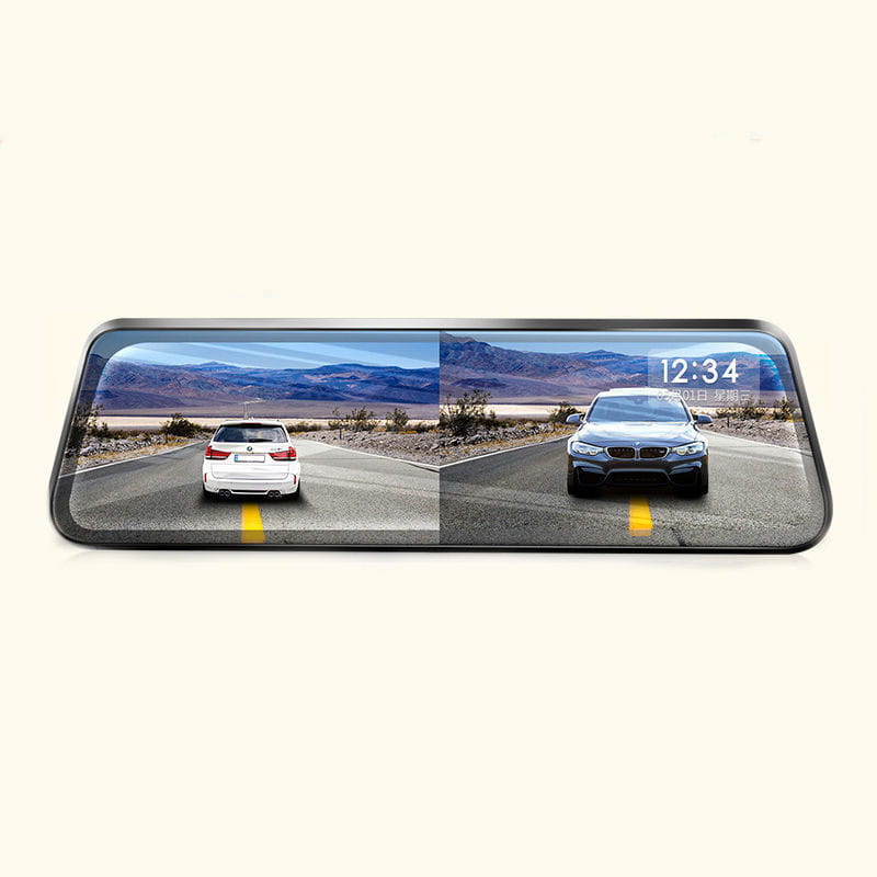 Black-framed night vision dual lens rearview mirror camera displaying a split view of two cars on a desert road with digital clock and date overlay.