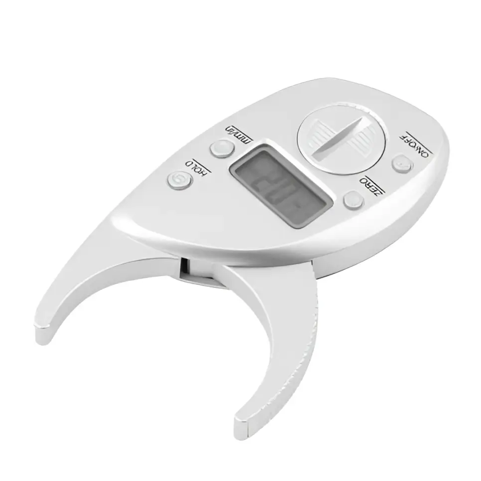 Silver digital body fat caliper with sleek ergonomic design and small lcd screen displaying precise measurements
