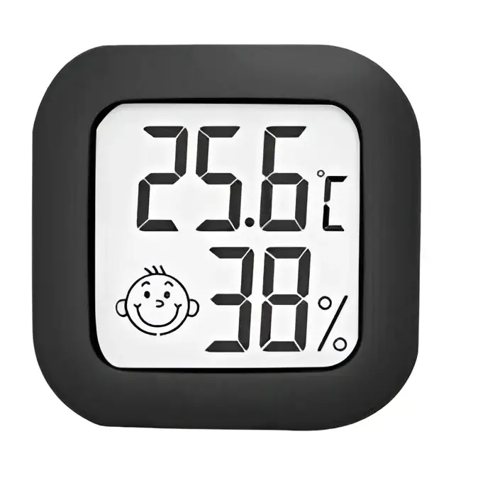 Digital display temperature and humidity meter black square with electronic digital display showing 25.6°c and 38% humidity measurement