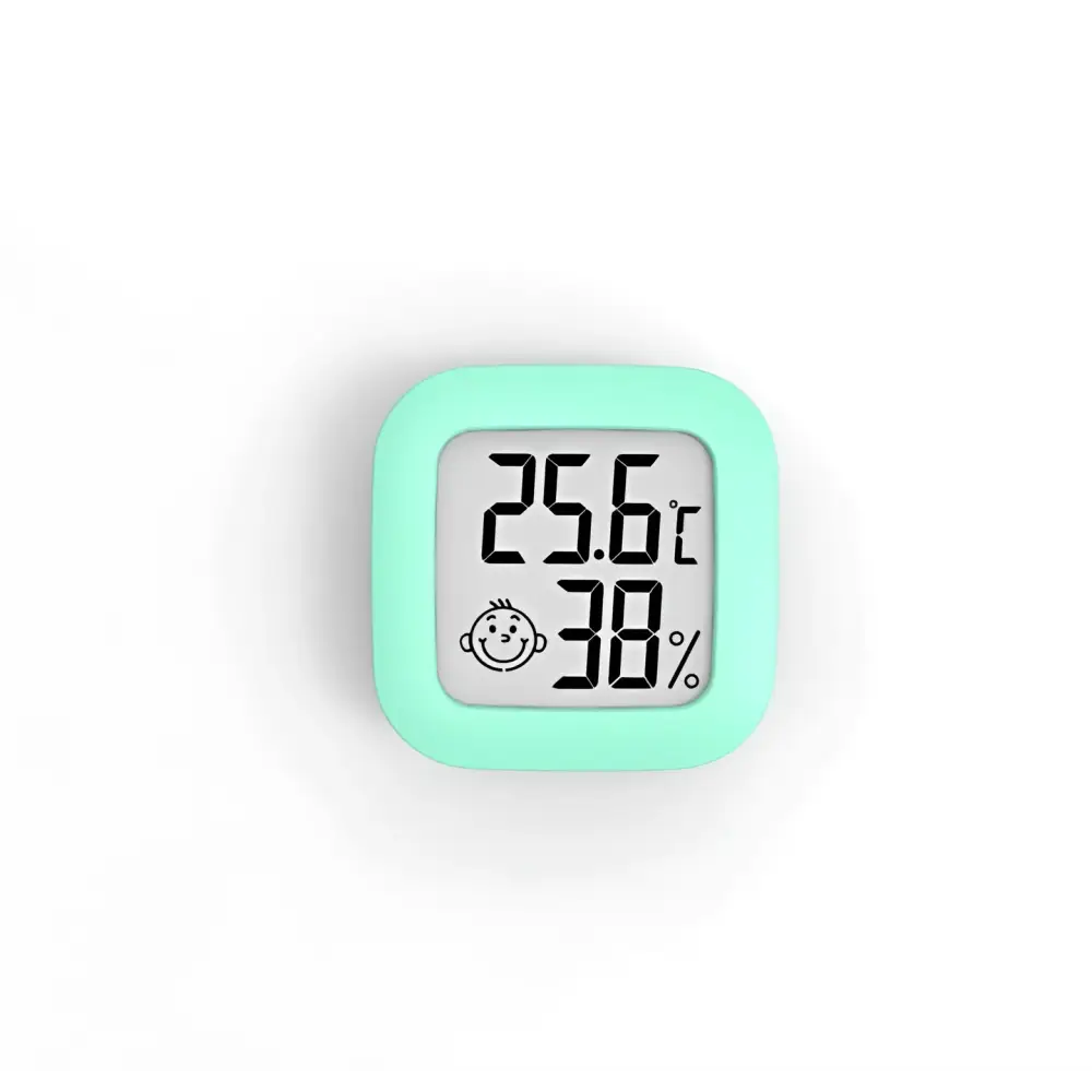 A mint green digital display temperature and humidity meter with electronic humidity measurement and smiling face icon