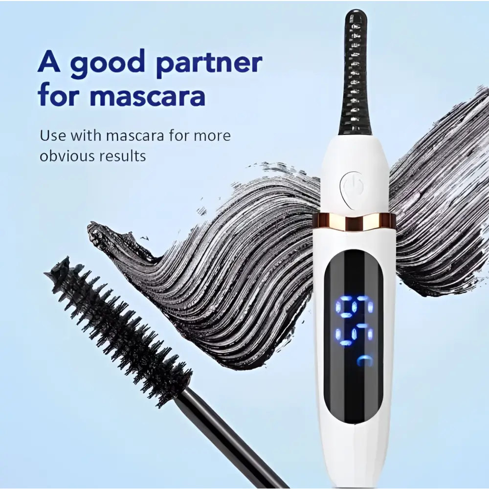 White and gold digital heated eyelash curler with black textured brush tip and digital display for rechargeable use