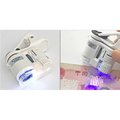 White plastic clip-on magnifier digital microscope camera with 100x zoom built-in led light and adjustable focus for currency inspection