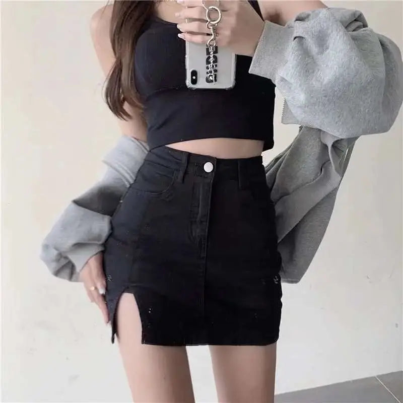 Black denim skirt with high-waisted distressed denim design featuring a side slit for a stylish look