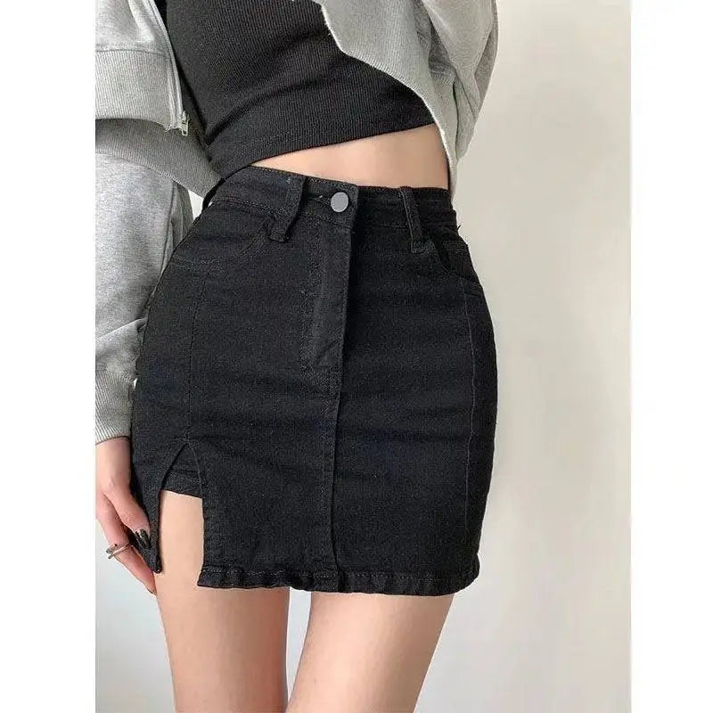 Black denim skirt with frayed hem and side slit made from high-waisted distressed denim fabric