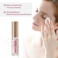 A sleek transparent bottle with rose gold cap and pink label containing iconsig brow lamination glue for professional use