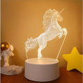 A glowing white unicorn 3d led night light with wireframe design on a cylindrical base featuring colorful touch remote control lights
