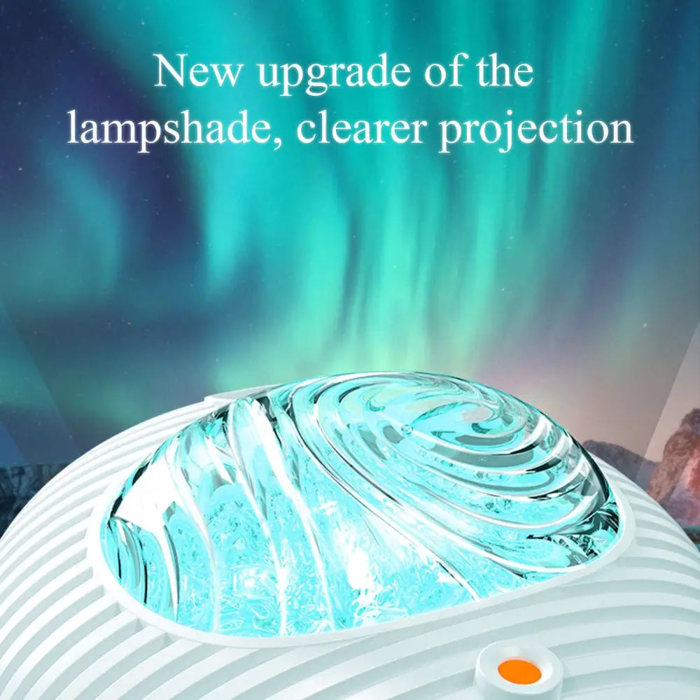 Double effect northern lights projector lamp with clear swirling glass lampshade white striped base and orange power button