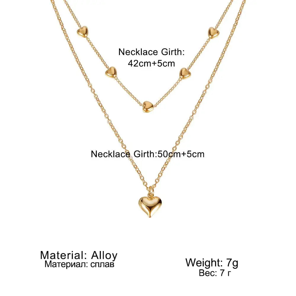 Gold-toned alloy double layer heart pendant fine chain necklace with three delicate chains and heart-shaped pendants
