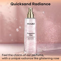 A clear glass bottle with gold-tone spray nozzle containing pink translucent mist of dream quicksand body spray syabo fragrance mist