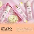 Three transparent glass bottles of Dream Quicksand Body Spray syabo fragrance mist with white bamboo caps and gold accents