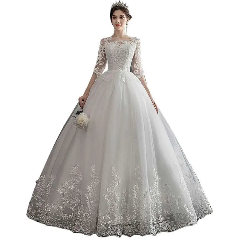Elegant dream slim sleeve lace ivory wedding gown with three-quarter sleeves and large size voluminous tulle skirt