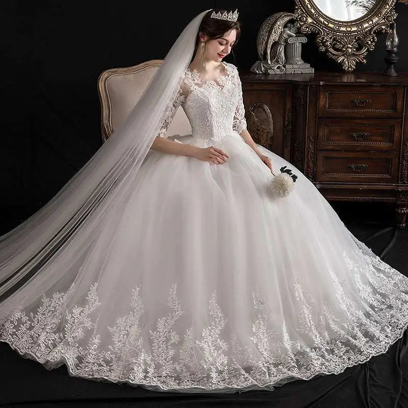 Elegant dream slim sleeve lace ivory wedding gown with three-quarter sleeves and floral embroidered tulle skirt large size