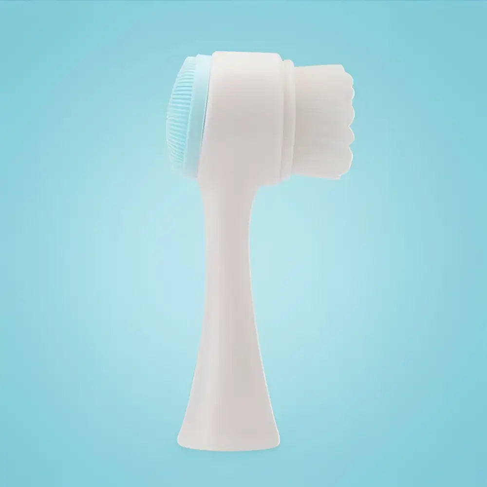 Dual sided silicone beauty skin care face wash with white and light blue rounded head and soft bristles for gentle cleansing