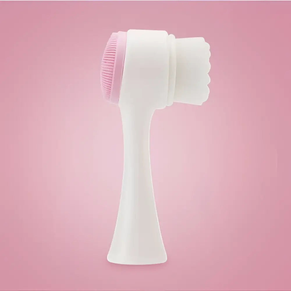 Dual sided silicone white and pink facial cleansing brush for gentle exfoliation in beauty skin care face wash use