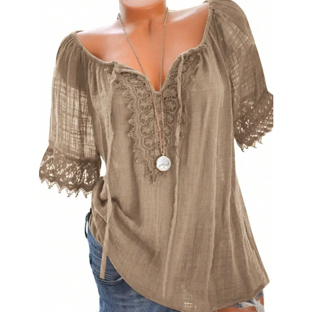 A dusty rose solid blouse with color contrast lace short sleeve and delicate lace trim featuring a relaxed fit