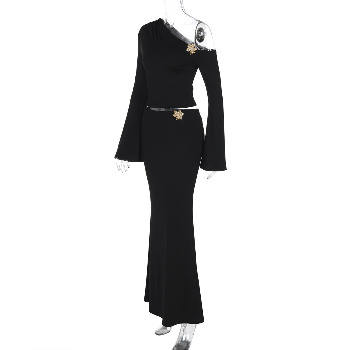 Black sexy slim oblique shoulder flared dress featuring gold floral embellishments at the shoulder and waist in a slim oblique shoulder mermaid style.